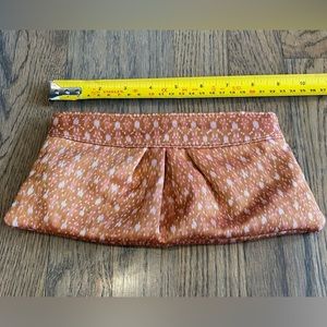 LAUREN MERKIN | Burnt Orange clutch. NWOT. Approx 10 x 5 inches. Made in NYC
